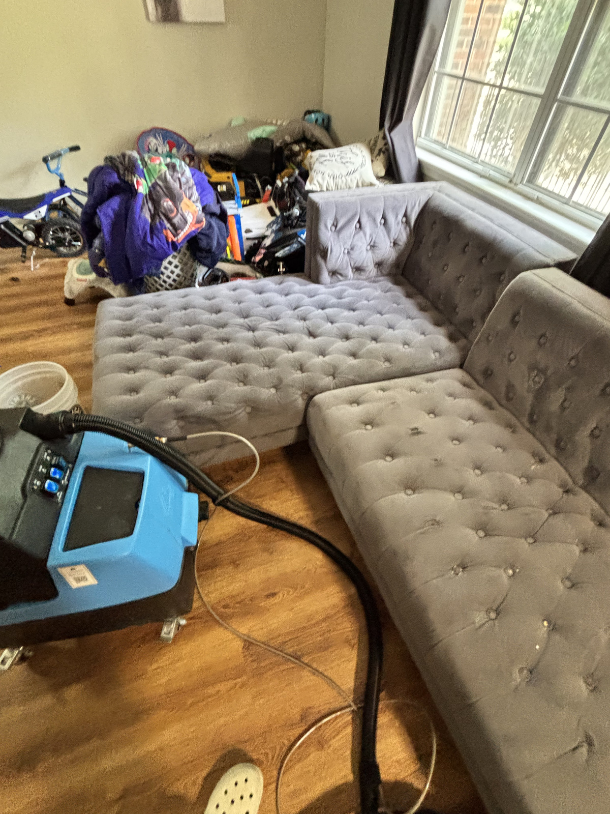Grey tufted chaise bench cleaned by Double Deep Clean