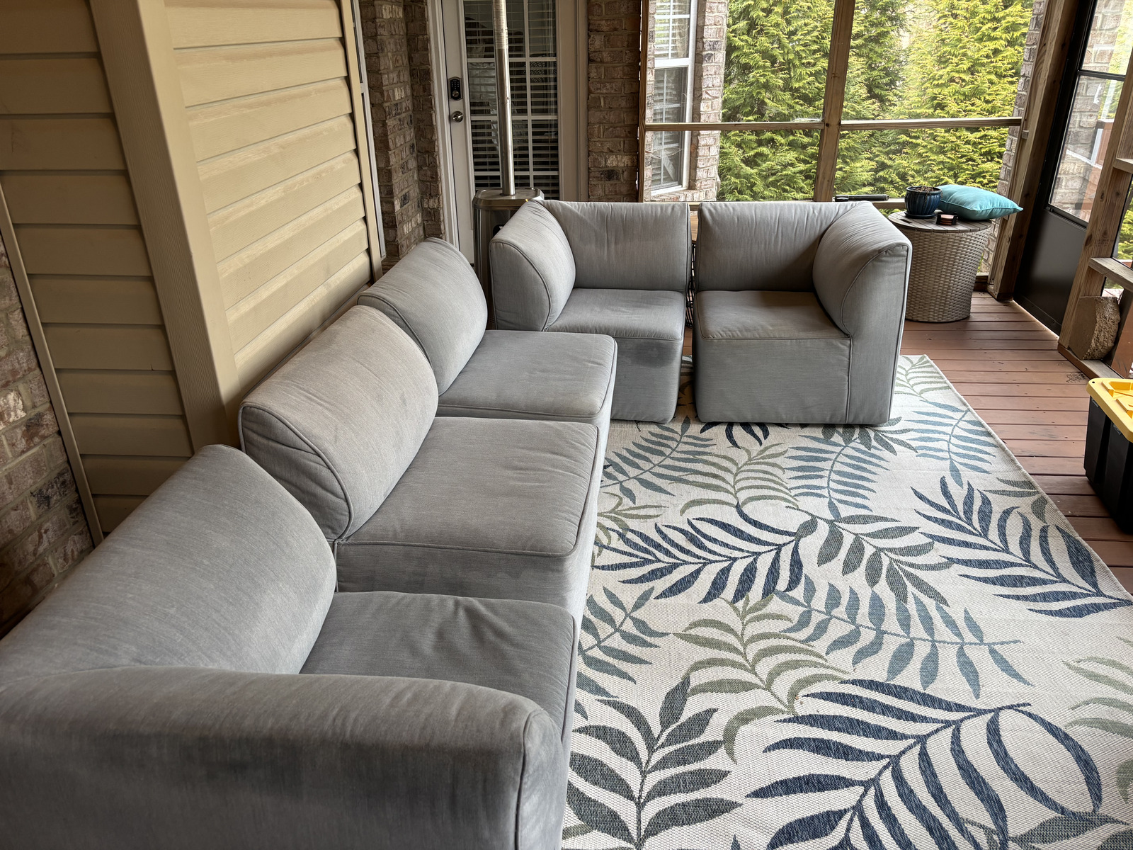 Sectional sofa on a patterned rug after upholstery cleaning