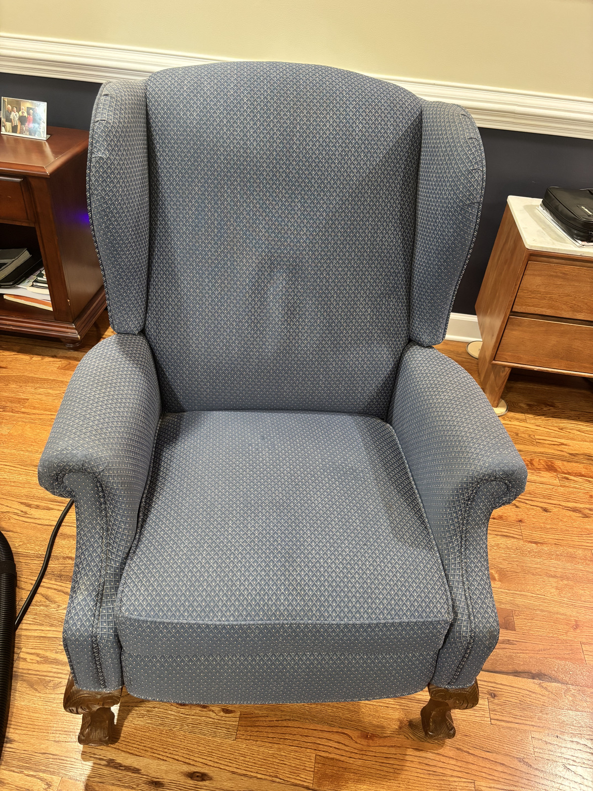Blue patterned wingback chair after a deep upholstery clean